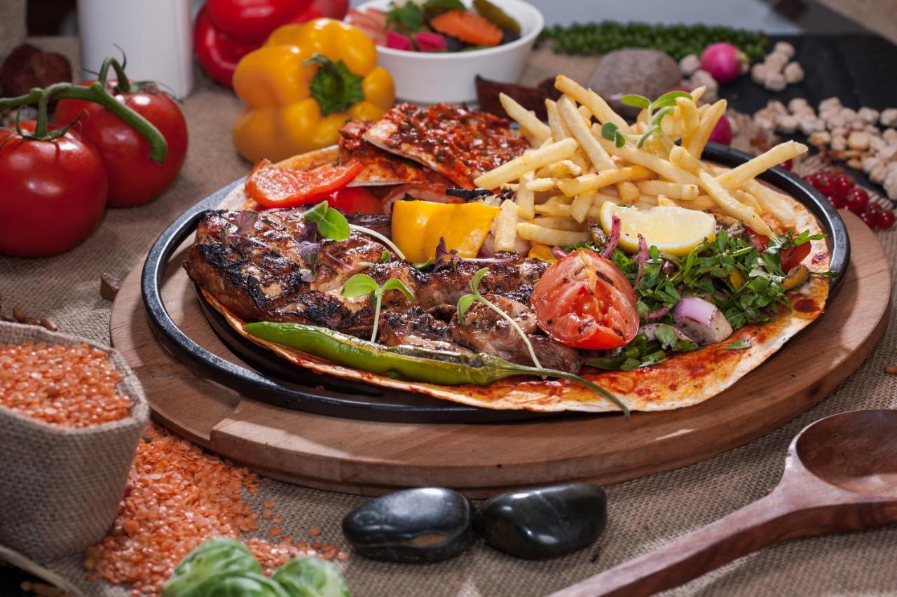 Fraser Suites Diplomatic Area Bahrain Manama Exterior photo A steak and chips meal